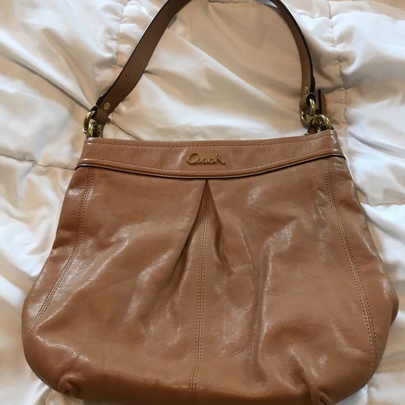 Coach Handbags - Coach handbag, lightly used, now eat or tear. Light brown with gold accents.